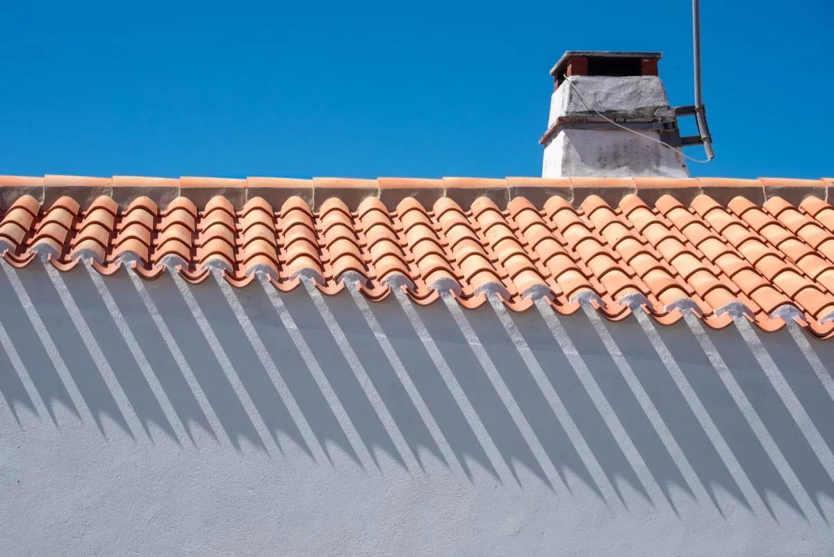 Roof ridge line and chimney on a home in Metairie, LA